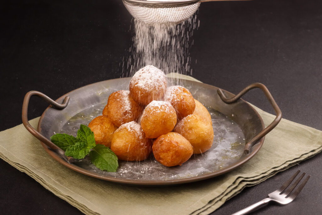 Loukoumades, Traditional Greek Donuts Or Honey Puffs. לוקומודוס